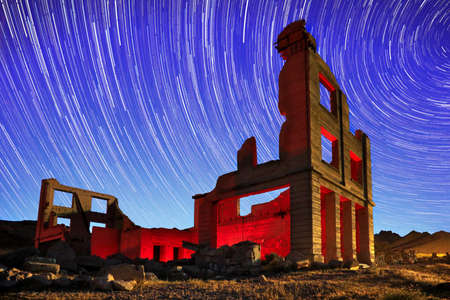 Abandoned Bank Located in Rhyolite, Nevada Light Painted With Blue Hour Skyの写真素材