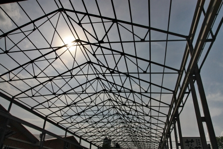 Metallic structure in the roof of a warehouse の写真素材