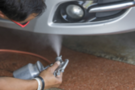 Blurry image, Man was washing car with spray bottle, Car cleaning, Car washingの写真素材