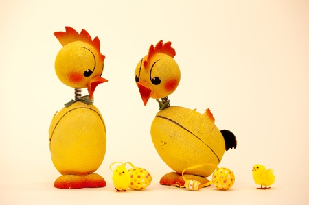The Easter chickens from the fifties discuss lively the new ones and their eggs   