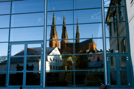 Uppsala, Sweden - October 28,2012  The reflection of Uppsala Cathedral and Upplands museum のeditorial素材