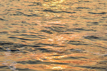 Sea texture in the sunset timeの写真素材