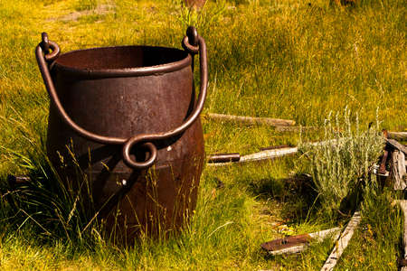 Rusted slag bucket from the silver mining days that has been left to rust in the open air.の写真素材