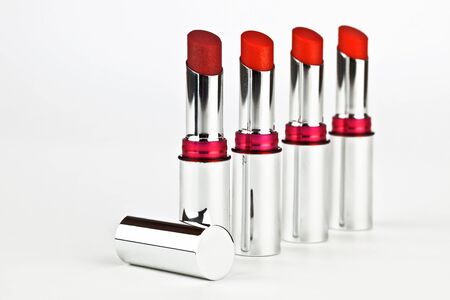 Four lipsticks in a crome case.の写真素材
