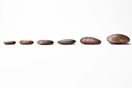 A shot of river pebbles in a strait formation.の写真素材