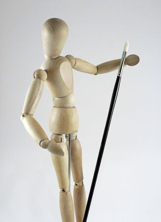 Closeup of artist manikin and artist brushの写真素材