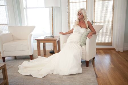 Bride Posing on a Chairの写真素材