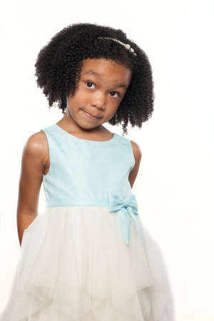 Adorable African American Young Girl with Cute Facial Expressionの写真素材