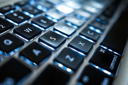 Black Back Lit Keys on a Laptop Keyboardの写真素材