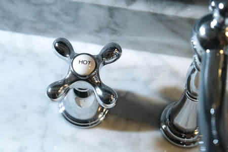 Chrome Faucet Handle in a Residencial Bathroomの写真素材