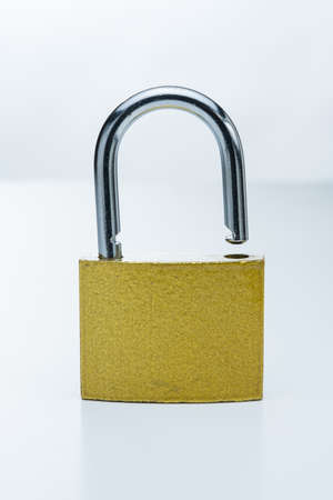 Simple Gold Lock on White Backgroundの写真素材