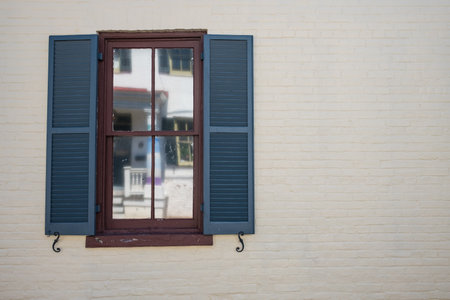 Vintage Looking Window and Shutters from an Old Houseの写真素材