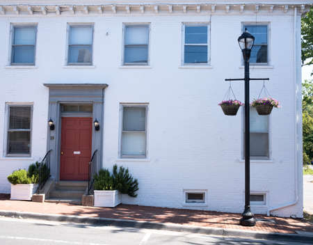 Vintage Looking Front Door Window and Shutters from an Old Houseの写真素材