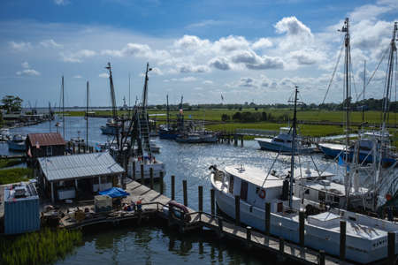Small Fishing and Shrimp Boat Docked in Late Afternoon Sunlight
