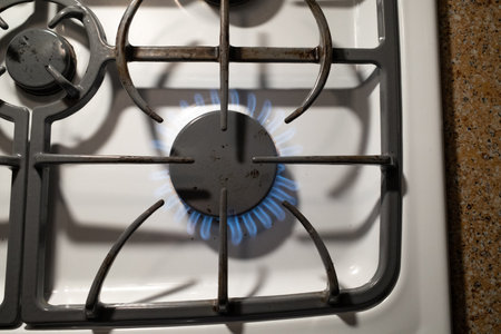 Natural Gas Flames on a White Gas Stoveの写真素材