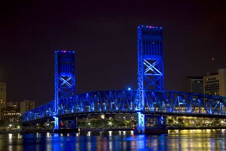 Bridge in Jacksonville, Florida, light up with blue lights at night.の写真素材