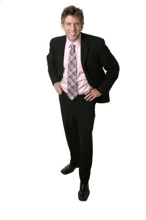 Businessman satnding withhands on hipsの写真素材