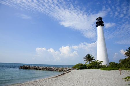 Key Biscayne Lighthouse over looks the ocean on a brilliant Florida morningの写真素材