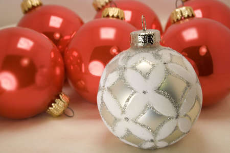 closeup of glittery silver and white Christmas ornamentの写真素材