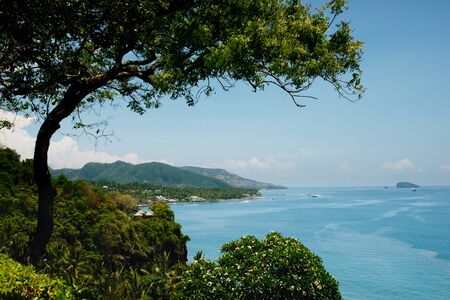 Looking over the ocean from a high point of view in Bali, Indonesia.の写真素材