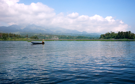 One asian man boating on the river at daytime.の写真素材