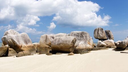 Natural rock formation on a white sand beach in Belitung Island in the afternoon, Indonesia.の写真素材