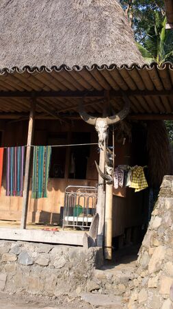Cow skull house of Bena a traditional village with grass huts of the Ngada people in Flores near Bajawa, Indonesia.の写真素材