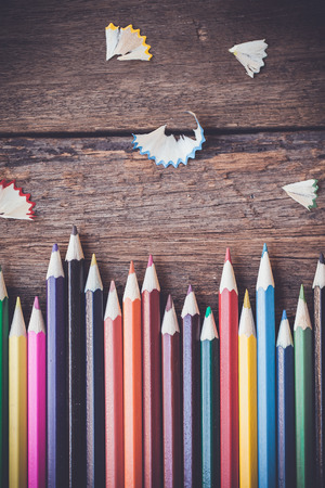 Color pencils on wooden backgroundの写真素材