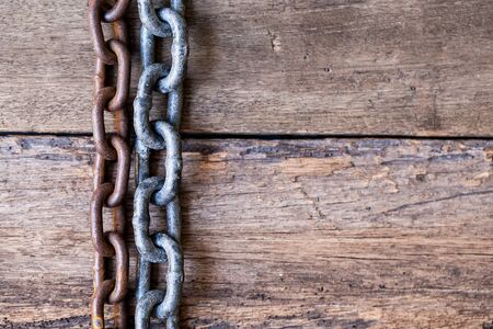 Chain on wooden backgroundの写真素材
