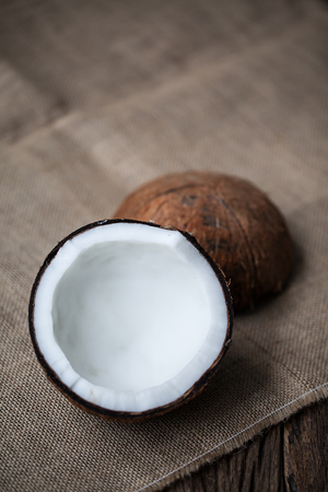 coconut on a wooden backgroundの写真素材