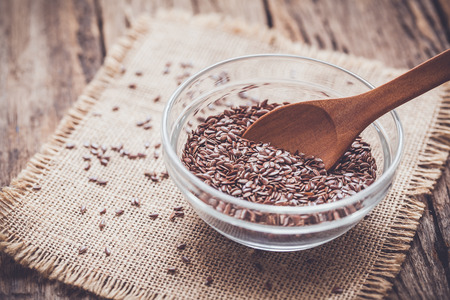 Flax seeds in a bowlの写真素材