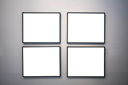 blank photo frame on the wallの写真素材