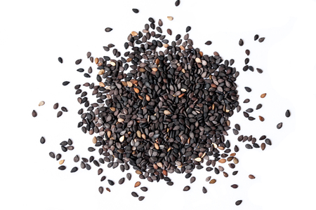 black sesame seeds on white backgroundの写真素材