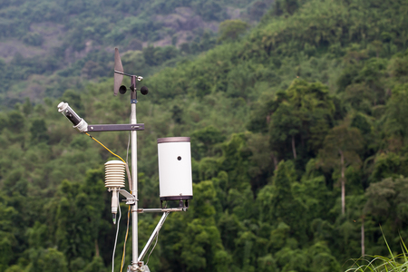 Weather meter with mountain backgroundの写真素材