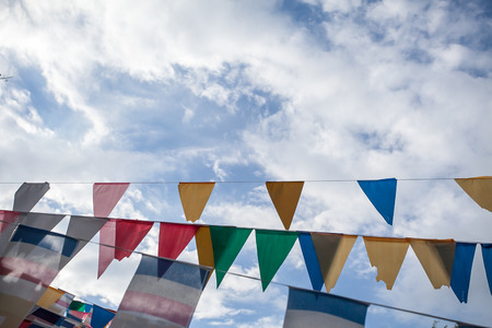 Colorful flags with blue sky