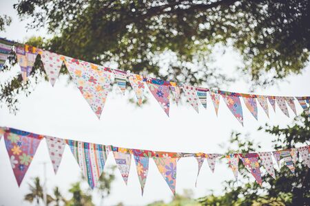 Colorful flags in garden