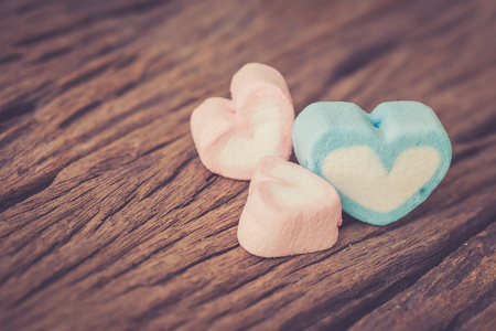 marshmallows on wooden backgroundの写真素材