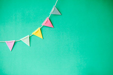 Colorful flags on green backgroundの写真素材