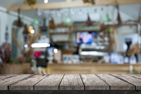Empty wood Shelf on coffee cafe backgroundの写真素材