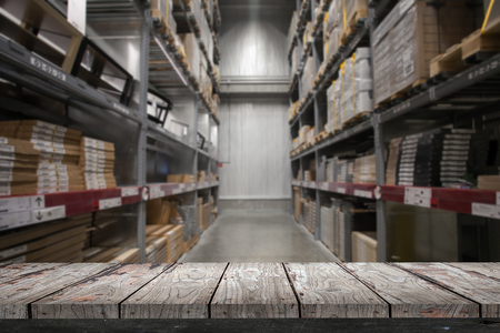 Empty wood Shelf on storage warehouse backgroundの写真素材