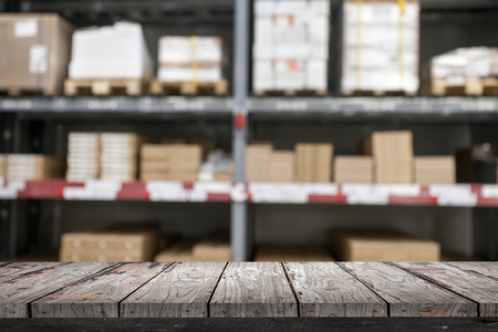 Empty wood Shelf on storage warehouse backgroundの写真素材
