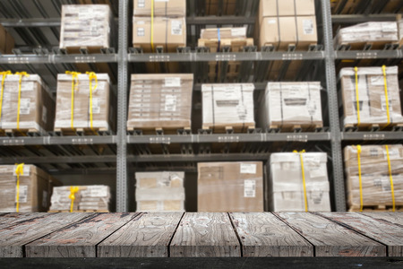 Empty wood Shelf on storage warehouse backgroundの写真素材