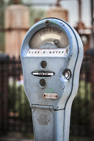 Photograph of an old and dilapidated metal meterの写真素材