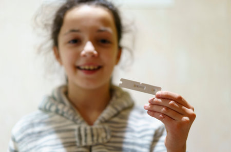 Girl with Covid-19 antigen test with negative resultの写真素材