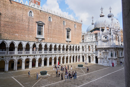 Venice, Italy; Jun 6 2024: Interior courtyard of Doge's Palace showing the brick facade.のeditorial素材