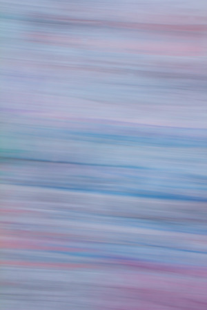 Creative abstract background resembling brush or pastel painting full of dynamics in purple, blue,...