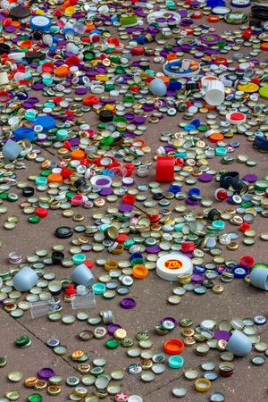 Berlin, Germany, 12.05.2018, enormous quantity of metal and plastic caps in golden, red, green, blue, white, silver etc. Recycling, environment, ecologyのeditorial素材