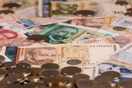 A composition of Bulgarian lev banknotes and coins providing great options to be used for...