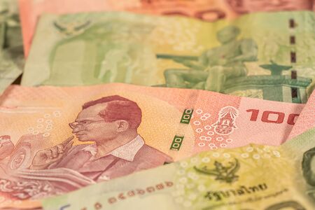 A composition of Thai baht. THB banknotes providing great options to be used for illustrating...