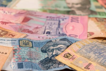 A composition of Ukrainian hryvnia. UAH banknotes providing great options to be used for illustrating subjects as business, banking, media, etc.の写真素材